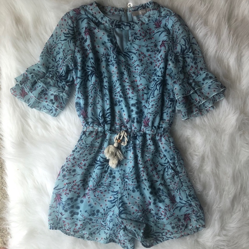 Girls floral playsuit/romper size 10